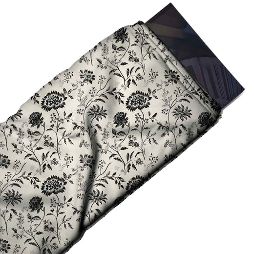 Flat fabric swatch: dense all-over layout of black cut-out style chrysanthemums, design Design No_4142, Clothwala