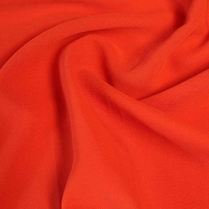 POLY GRAINY GEORGETTE ORANGE SOLID FABRIC