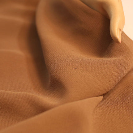 POLY GRAINY GEORGETTE BROWN SOLID FABRIC