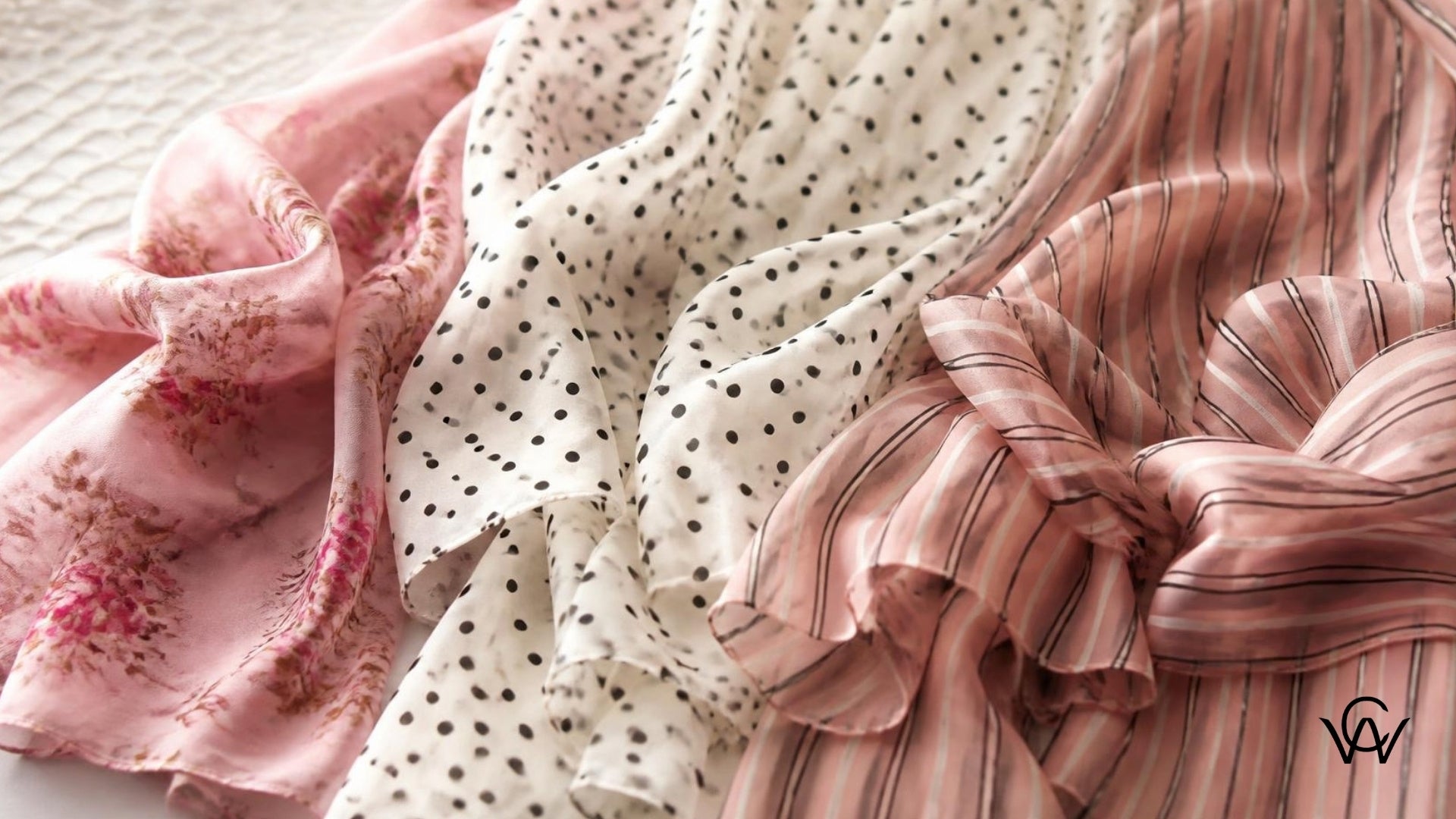Flowing georgette fabric tops in floral, polka dot, and striped prints draped together at Clothwala