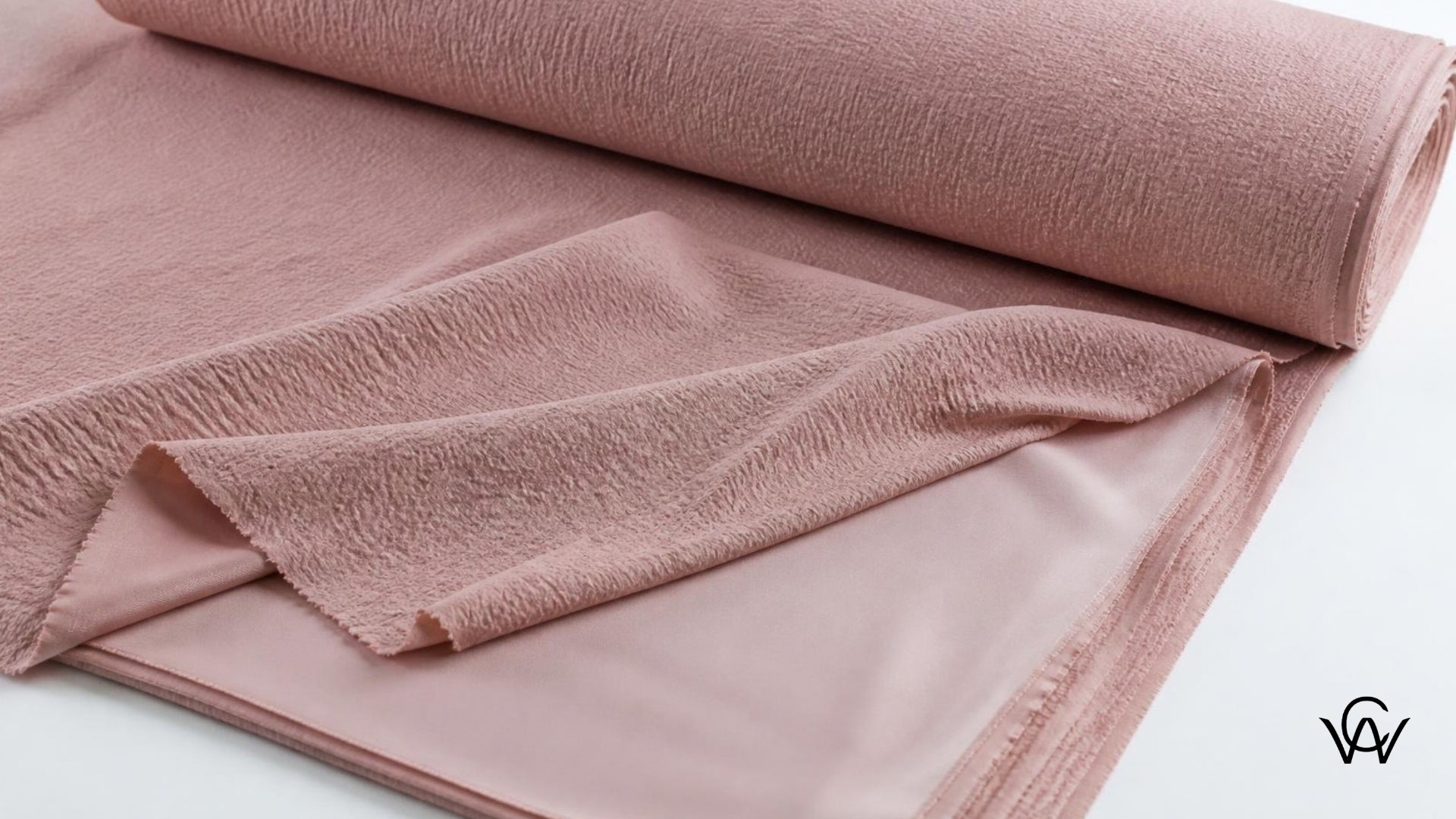 Crepe fabric texture close-up showing lined and unlined layers - Clothwala fabric photography
