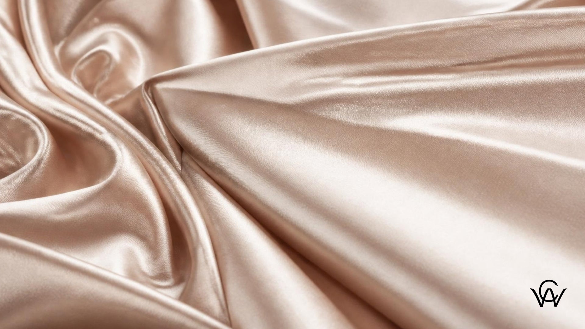 Close-up of luxurious champagne satin fabric showing its glossy sheen and smooth drape at Clothwala