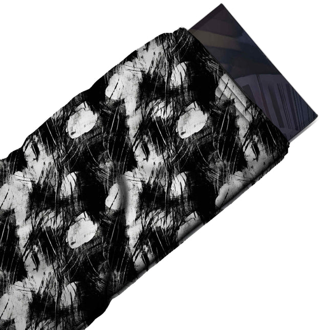 Flat fabric swatch: dark all-over print of heavy black brushwork broken by irregular white, design Design No_4006, Clothwala