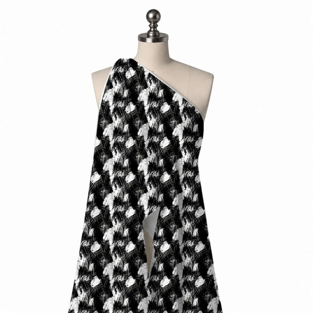 Draped on a mannequin: dark all-over print of heavy black brushwork broken by irregular, design Design No_4006, Clothwala