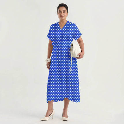 Luminous Cobalt polka dot fabric for dresses — draped on the roll
