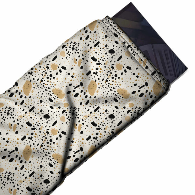 Flat fabric swatch: all-over scatter of black dots and short oval dashes that vary in size, design Design No_4038, Clothwala