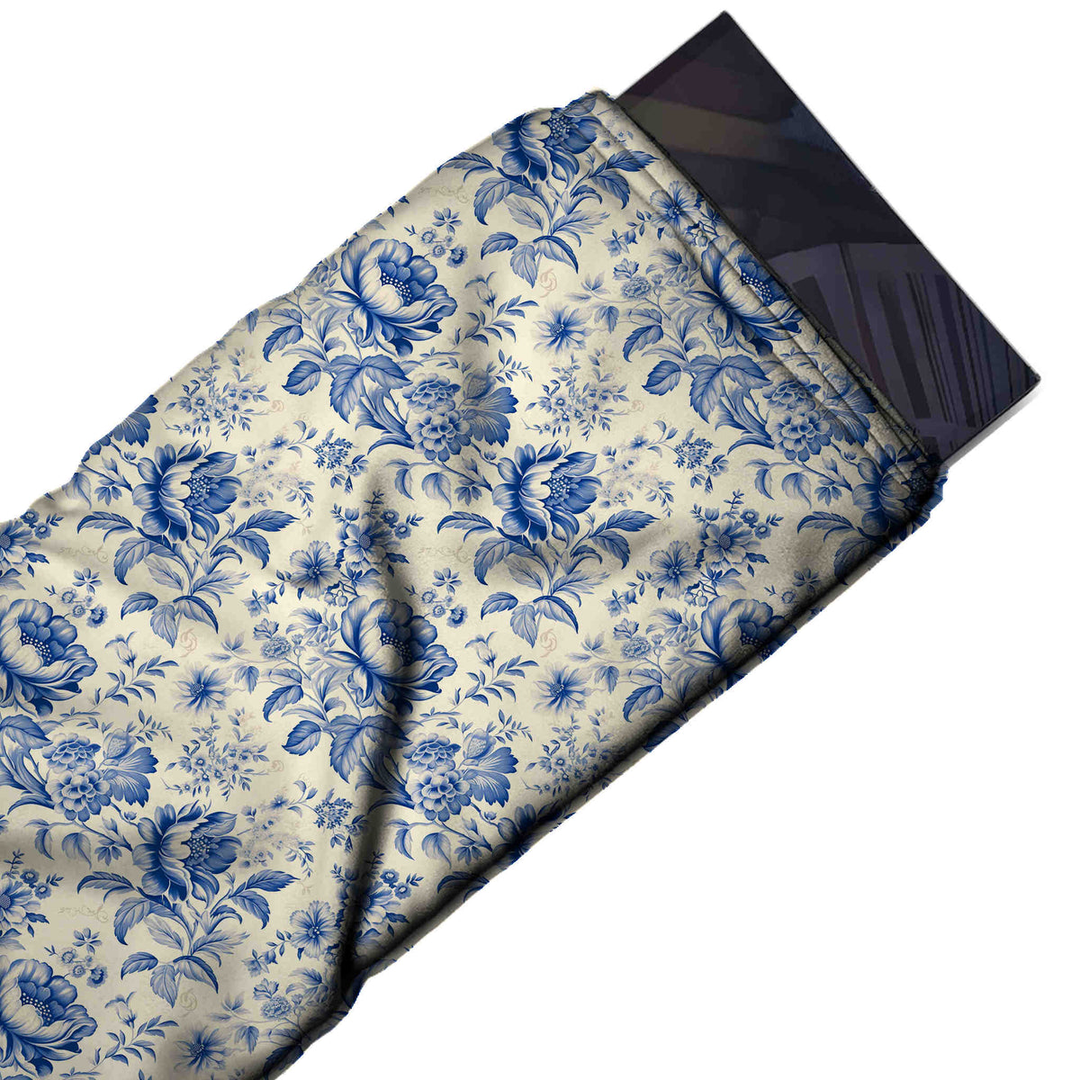 Flat fabric swatch: dense all-over layout of shaded cobalt and navy peonies with broad leaves, design 3597, Clothwala