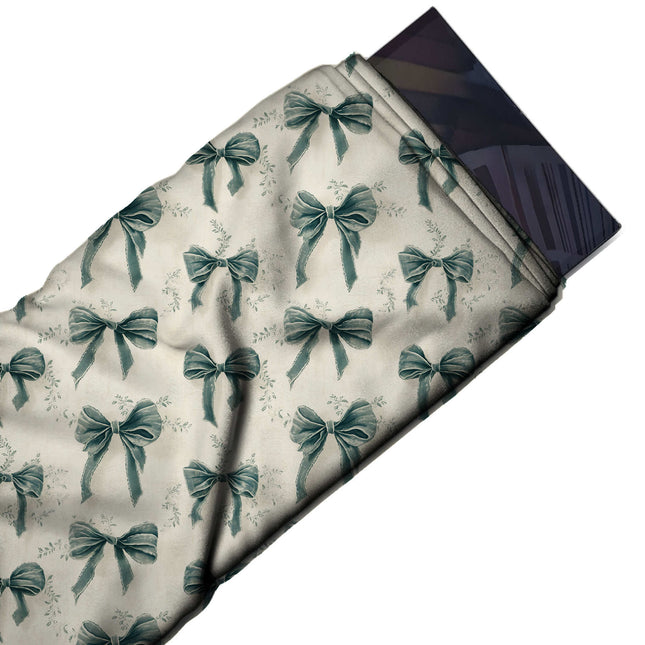 Flat fabric swatch: regular spaced repeat of medium dusty teal velvet-look bows with, design Design No_4442, Clothwala