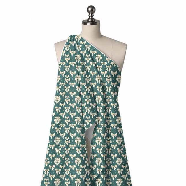 Draped on a mannequin: dense upright all-over layout of small cream bows with brown line, design Design No_4439, Clothwala