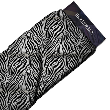 black animal print fabric draped — statement jacket styling