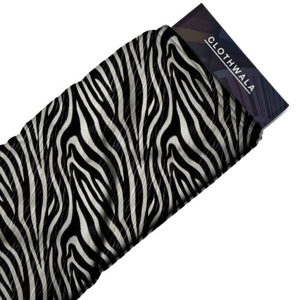 black animal print fabric draped — blazer styling