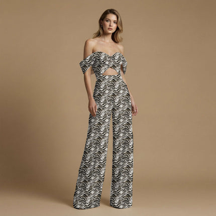 black animal print fabric draped — handbag styling