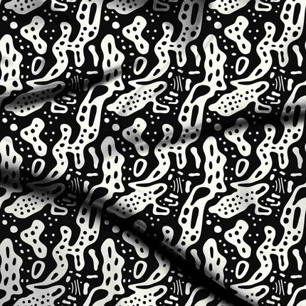 jet black abstract digital print fabric texture — medium scale closeup