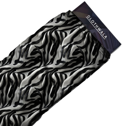 black animal print fabric draped — palazzo suit styling