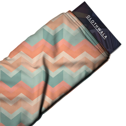 peach geometric fabric detail — textured finish digital print closeup