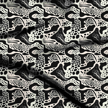 jet black abstract digital print fabric texture — medium scale closeup