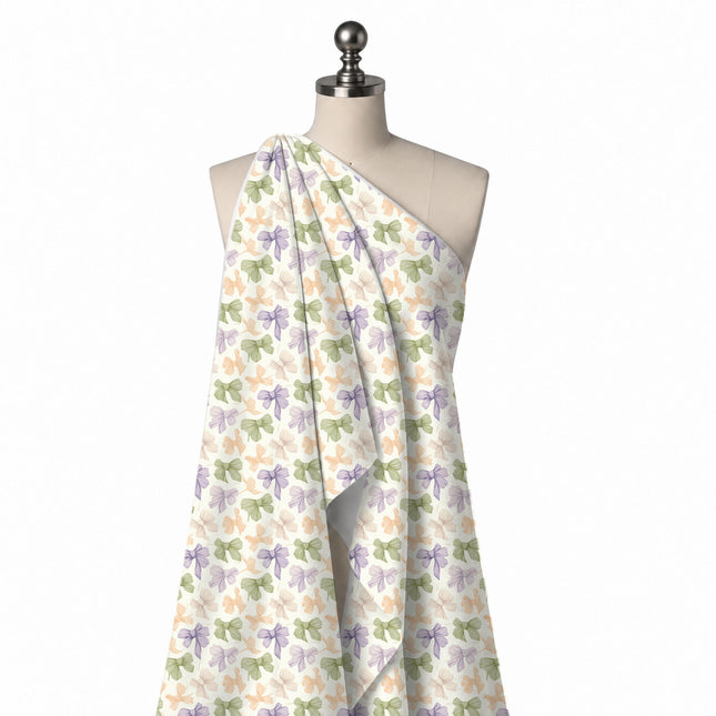 Draped on a mannequin: tossed all-over layout of medium bows drawn with fine parallel, design Design No_4403, Clothwala
