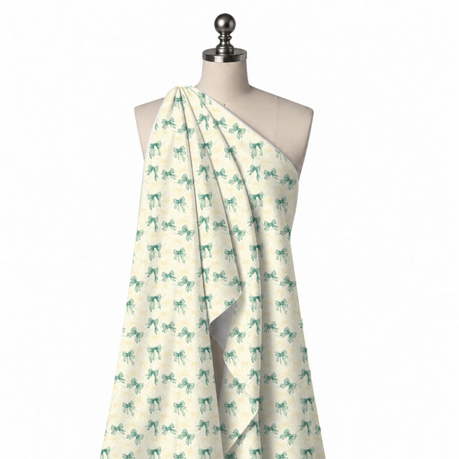Draped on a mannequin: spaced layout of medium teal green bows with engraved hatch shading, design Design No_4452, Clothwala