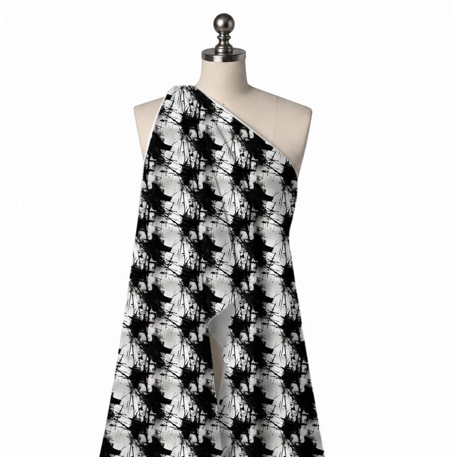 Draped on a mannequin: all-over repeat of large solid black ink blots with thin spiky, design Design No_4008, Clothwala