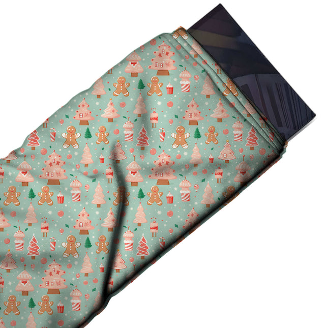 Flat fabric swatch: all-over one-way festive print of small gingerbread men, design Design No_4890, Clothwala