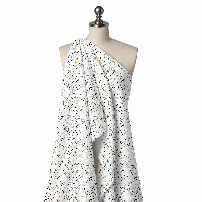 Draped on a mannequin: all-over print of small black dots in mixed sizes gathered in loose, design Design No_4048, Clothwala