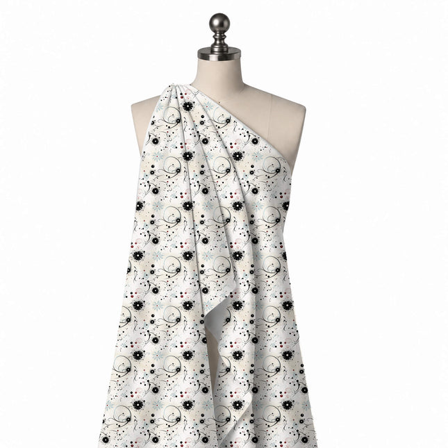 Draped on a mannequin: open scattered layout of small black daisies with white centres, design Design No_4389, Clothwala