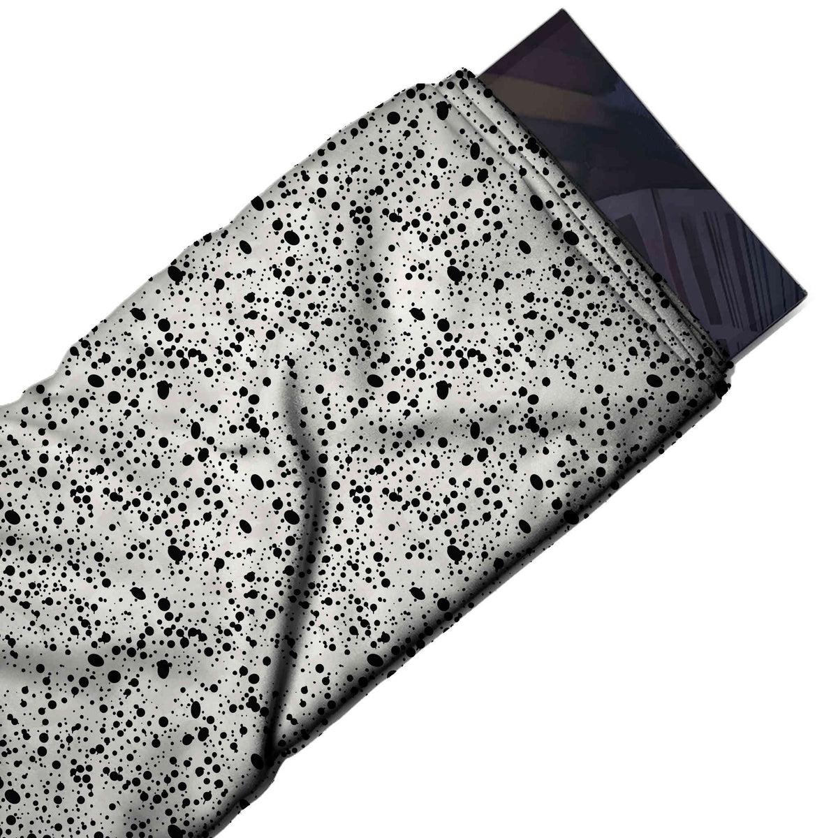 Flat fabric swatch: dense all-over speckle of tiny black dots and small irregular blots in, design Design No_4034, Clothwala