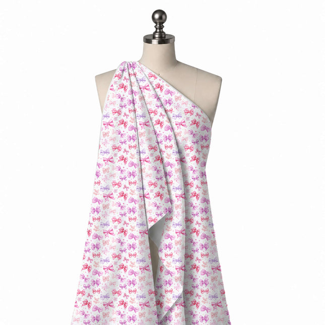 Draped on a mannequin: multi-directional scatter of small to medium shaded bows in hot, design Design No_4470, Clothwala