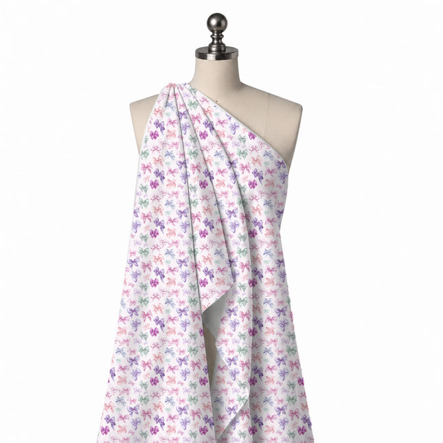 Draped on a mannequin: small-scale close-set layout of shaded bows in pale pink, lilac, design Design No_4424, Clothwala