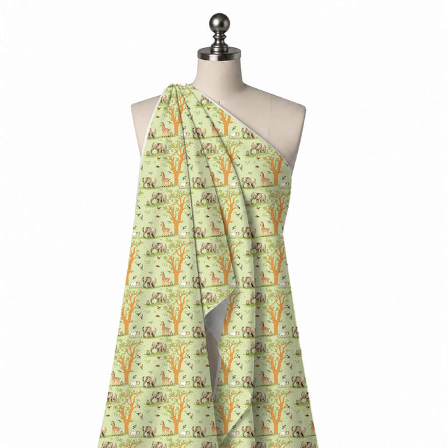 Draped on a mannequin: spaced one-way print of softly shaded grey elephants, design Design No_3898, Clothwala