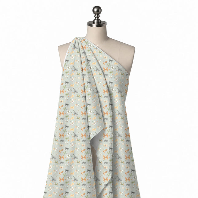 Draped on a mannequin: small-scale tossed layout of sketched ribbon bows in orange, peach, design Design No_4394, Clothwala