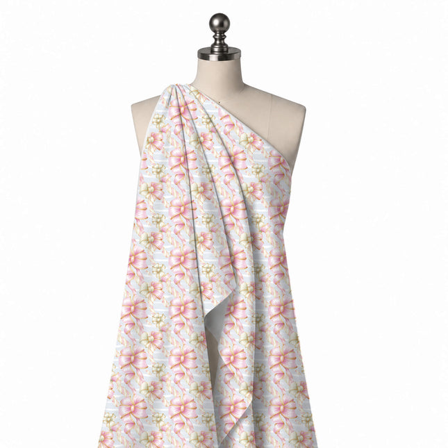 Draped on a mannequin: large-scale layout of shaded pink satin bows with gold edging and, design Design No_4874, Clothwala