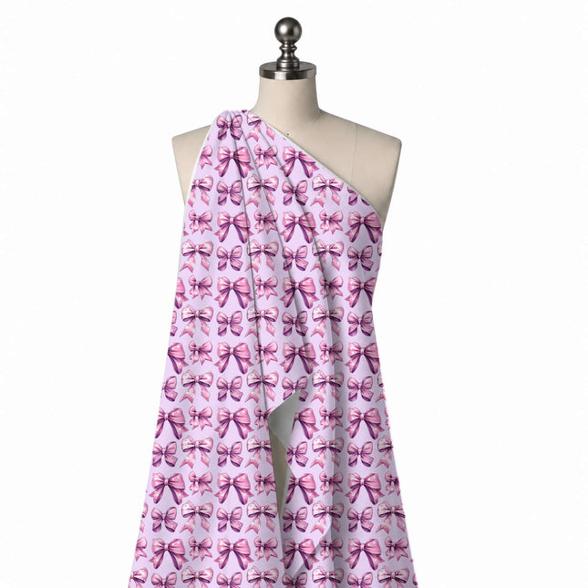 Draped on a mannequin: horizontal rows of large mauve pink bows with plum shading and, design Design No_4459, Clothwala