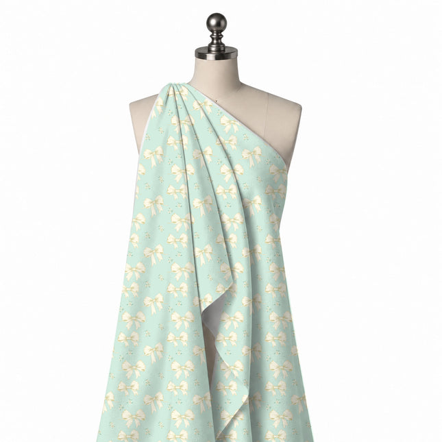 Draped on a mannequin: evenly spaced upright layout of medium cream bows with pale gold, design Design No_4437, Clothwala
