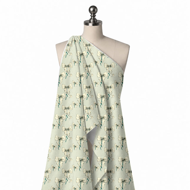 Draped on a mannequin: open one-way layout of medium cream bows with fine dark outline, design Design No_4434, Clothwala