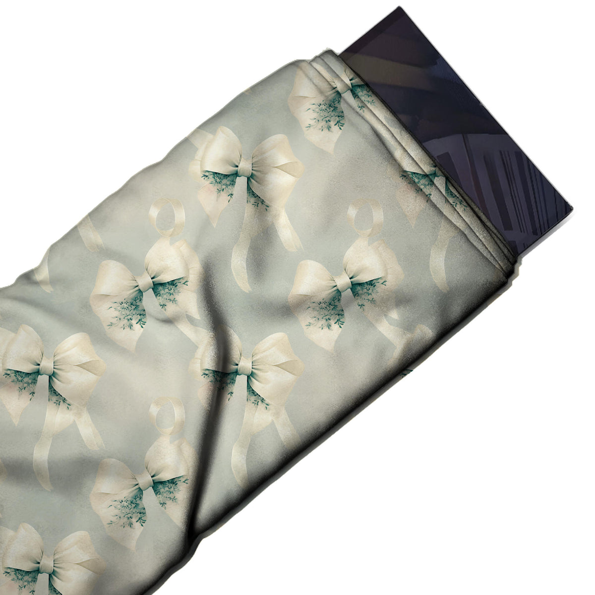 Flat fabric swatch: half-drop repeat of large soft-shaded ivory satin bows with teal green, design Design No_4441, Clothwala