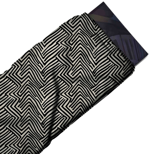 Flat fabric swatch: all-over geometric of closely packed black hand-drawn chevron lines, design Design No_4018, Clothwala