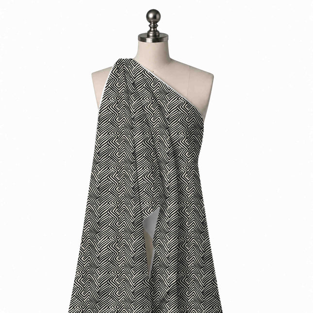 Draped on a mannequin: all-over geometric of closely packed black hand-drawn chevron lines, design Design No_4018, Clothwala