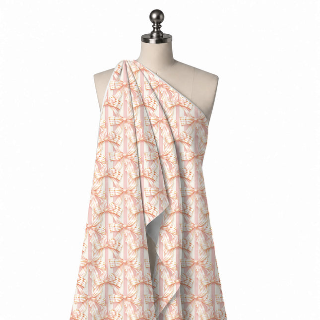 Draped on a mannequin: large-scale layout of shaded cream satin bows with gold and peach, design Design No_4877, Clothwala