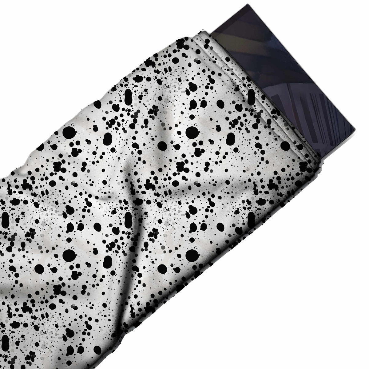 Flat fabric swatch: heavy-coverage all-over splatter of black ink drops from fine specks, design Design No_4047, Clothwala