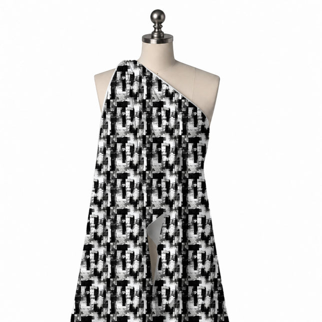 Draped on a mannequin: all-over monochrome check effect made of rough black brushed, design Design No_4063, Clothwala