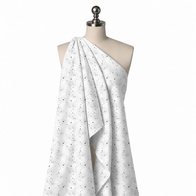 Draped on a mannequin: sparse all-over print of very small black specks and pin dots, design Design No_4043, Clothwala