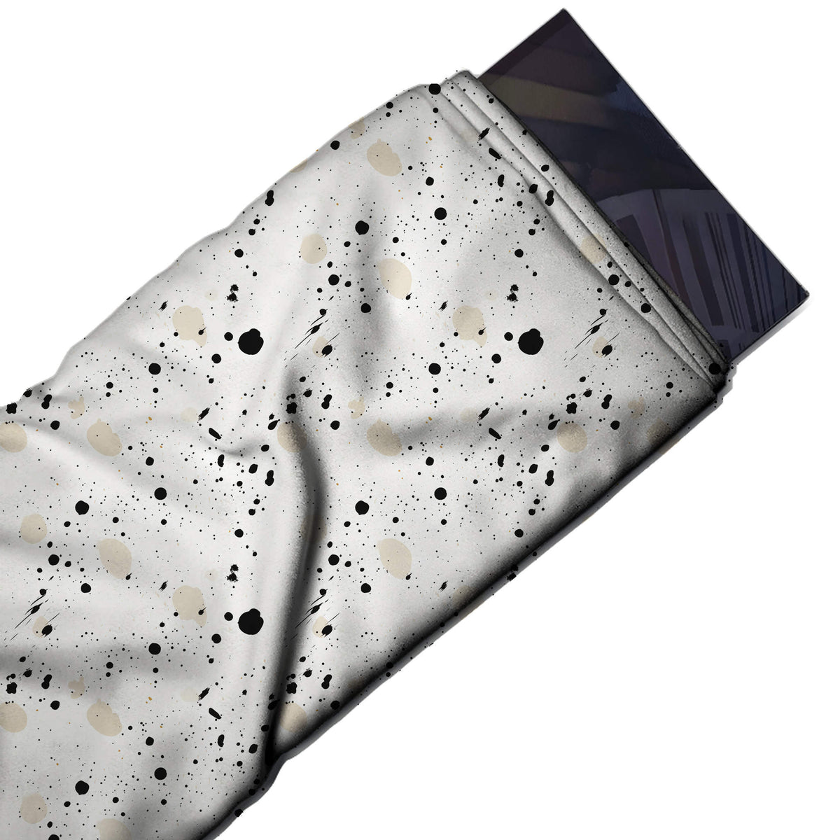 Flat fabric swatch: open all-over splatter print of small black ink drops and fine specks, design Design No_4042, Clothwala