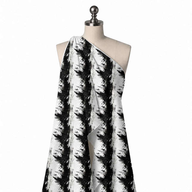 Draped on a mannequin: large-scale print of heavy black brush bursts with jagged, design Design No_4015, Clothwala