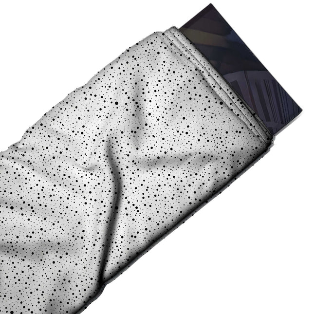 Flat fabric swatch: fine all-over random scatter of tiny round black dots in several pin, design Design No_4037, Clothwala