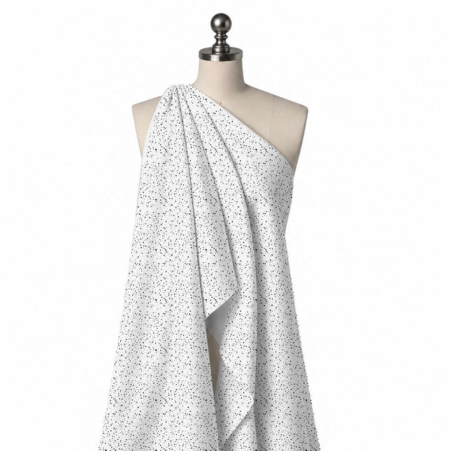 Draped on a mannequin: fine all-over random scatter of tiny round black dots in several, design Design No_4037, Clothwala