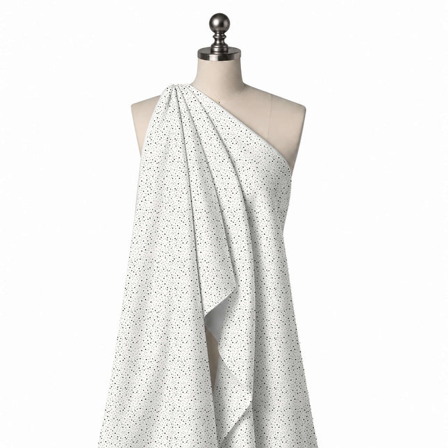 Draped on a mannequin: even all-over micro print of tiny black pin dots in two or three, design Design No_4045, Clothwala