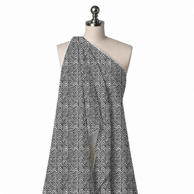 Draped on a mannequin: dense all-over geometric of black hand-drawn zigzag lines stacked, design Design No_4019, Clothwala