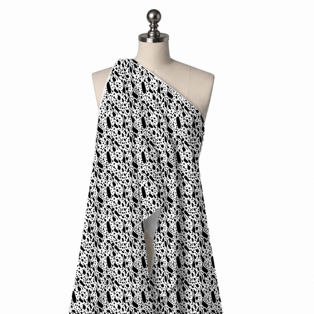 Draped on a mannequin: all-over two-colour print of solid black elongated blobs mixed with, design Design No_4040, Clothwala