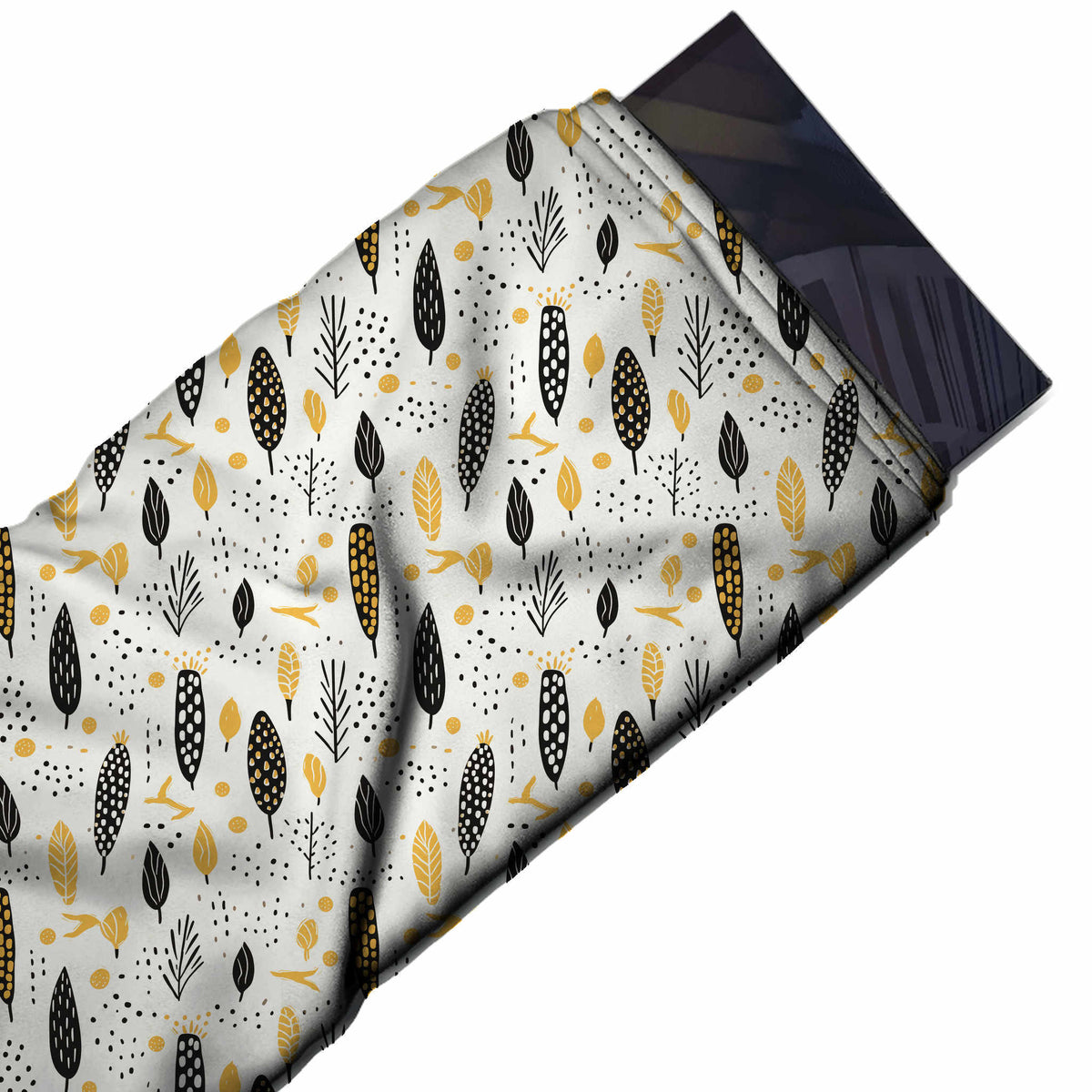 Flat fabric swatch: all-over one-way layout of small flat black and yellow leaves, design Design No_4097, Clothwala